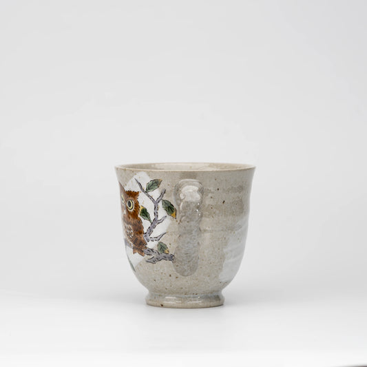 Three owls mug, side view showing the shape and surface.