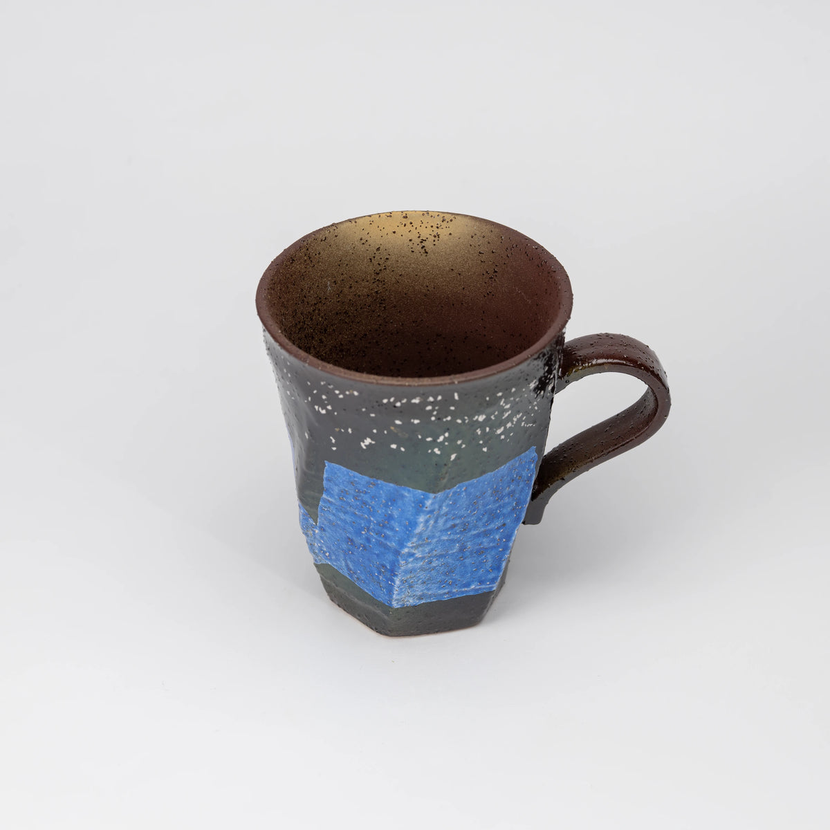 Blue ginsai mug, side view showing the shape and surface.