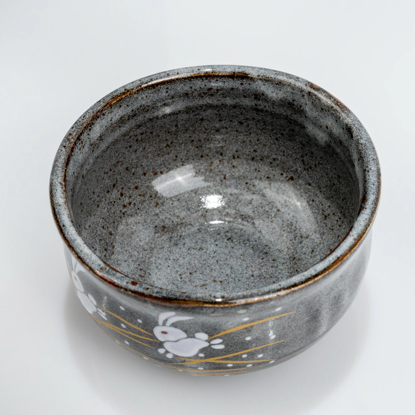 Angled top view inside Kutani hare rabbit matcha bowl