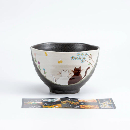 Side view of Kutani Hidamari rice bowl showing soft hand-painted design