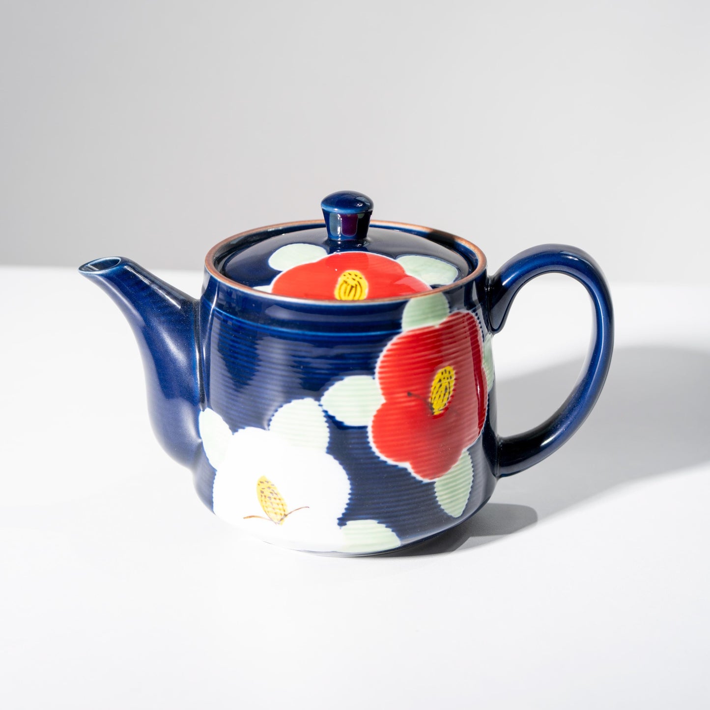 Complete Arita tea set displayed with wooden presentation box