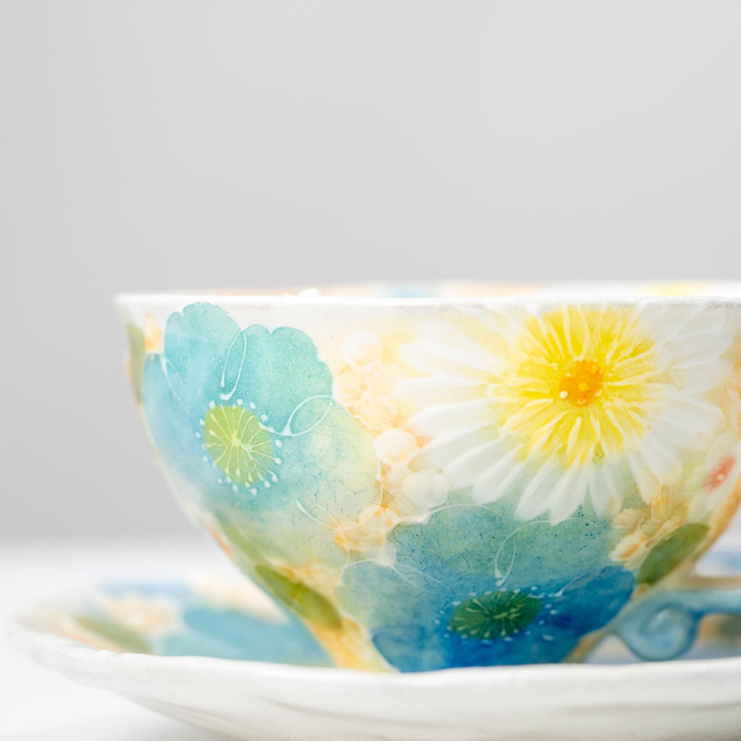 Full display of floral coffee cup and saucer set