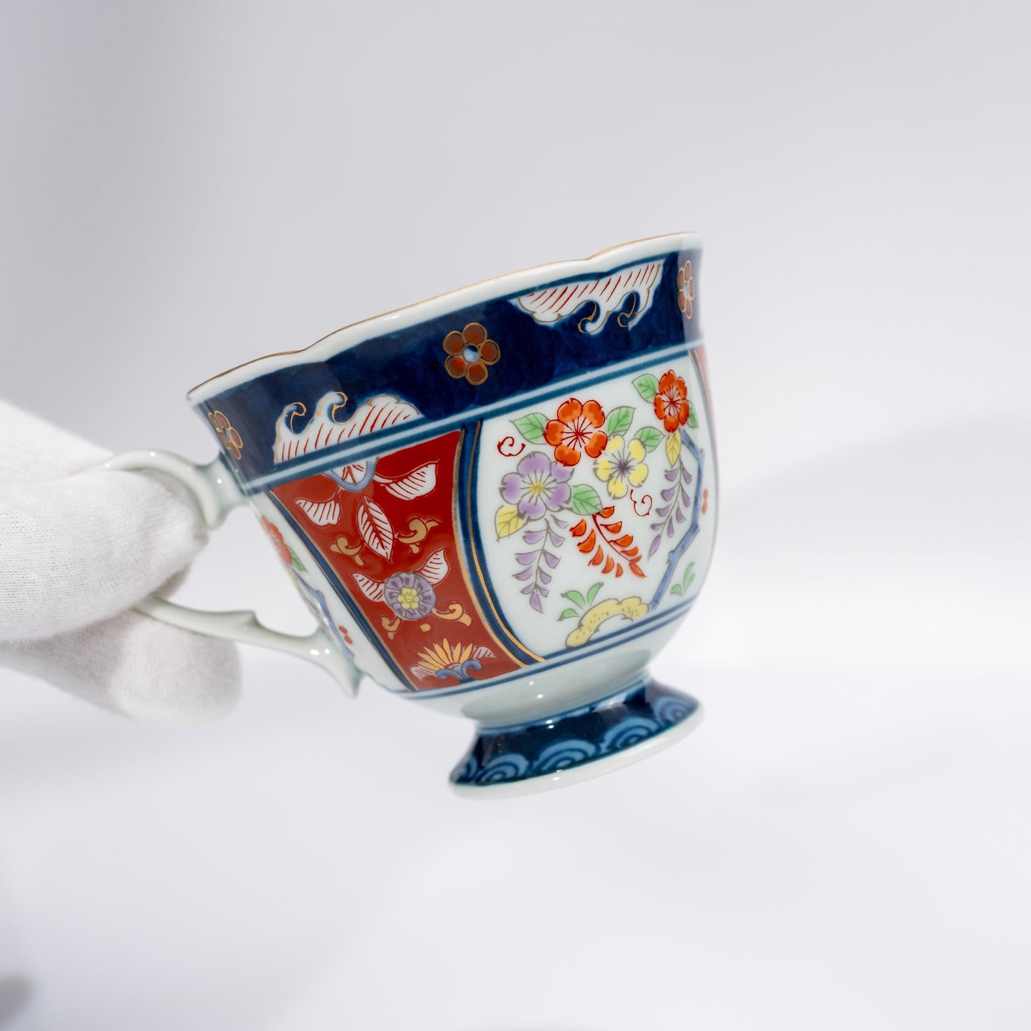 Cup and saucer displayed together in Arita porcelain