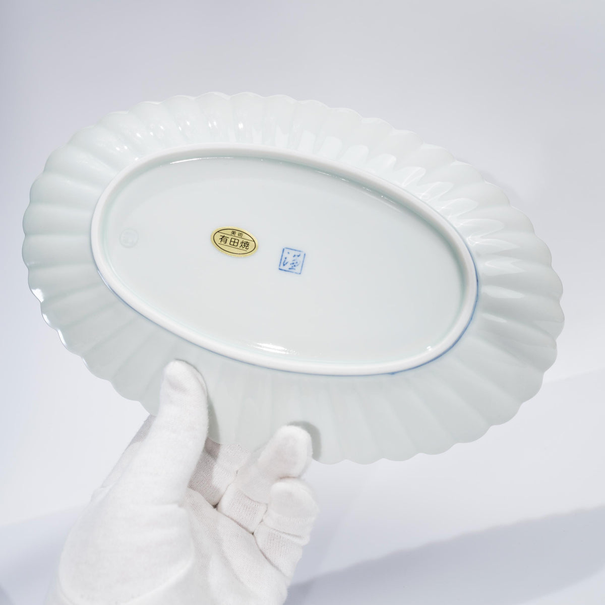 Underside of Arita porcelain serving plate showing base