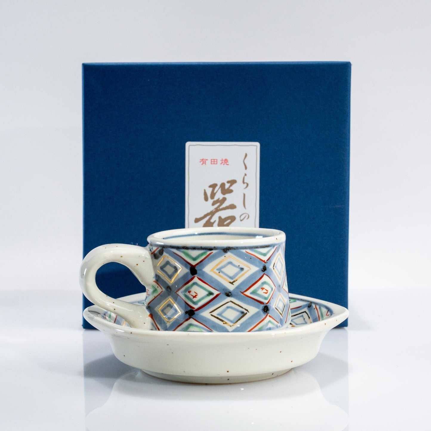 Close-up of hand-painted diamond motif on Arita demitasse cup