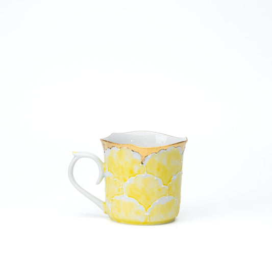 Yellow peony porcelain mug with a scalloped gold rim on white.