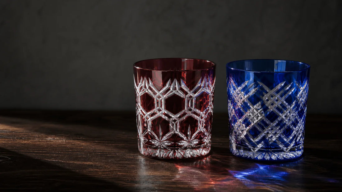 Equal-size red and blue Edo Kiriko tumblers with sharp kagome and yarai cut patterns
