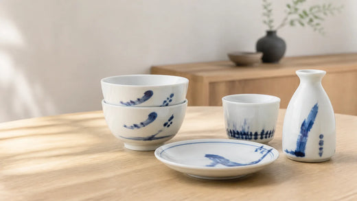 Blue-and-white Hasami porcelain bowls, cups, and plates set for an everyday meal