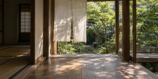 Light falling through open shoji onto a wooden engawa and garden, an editorial illustration of summer air.
