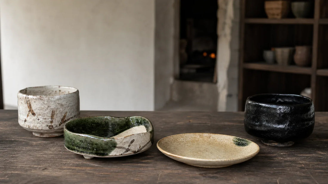 Shino, Oribe, Ki-Seto, and Setoguro vessels arranged in a Gifu pottery studio