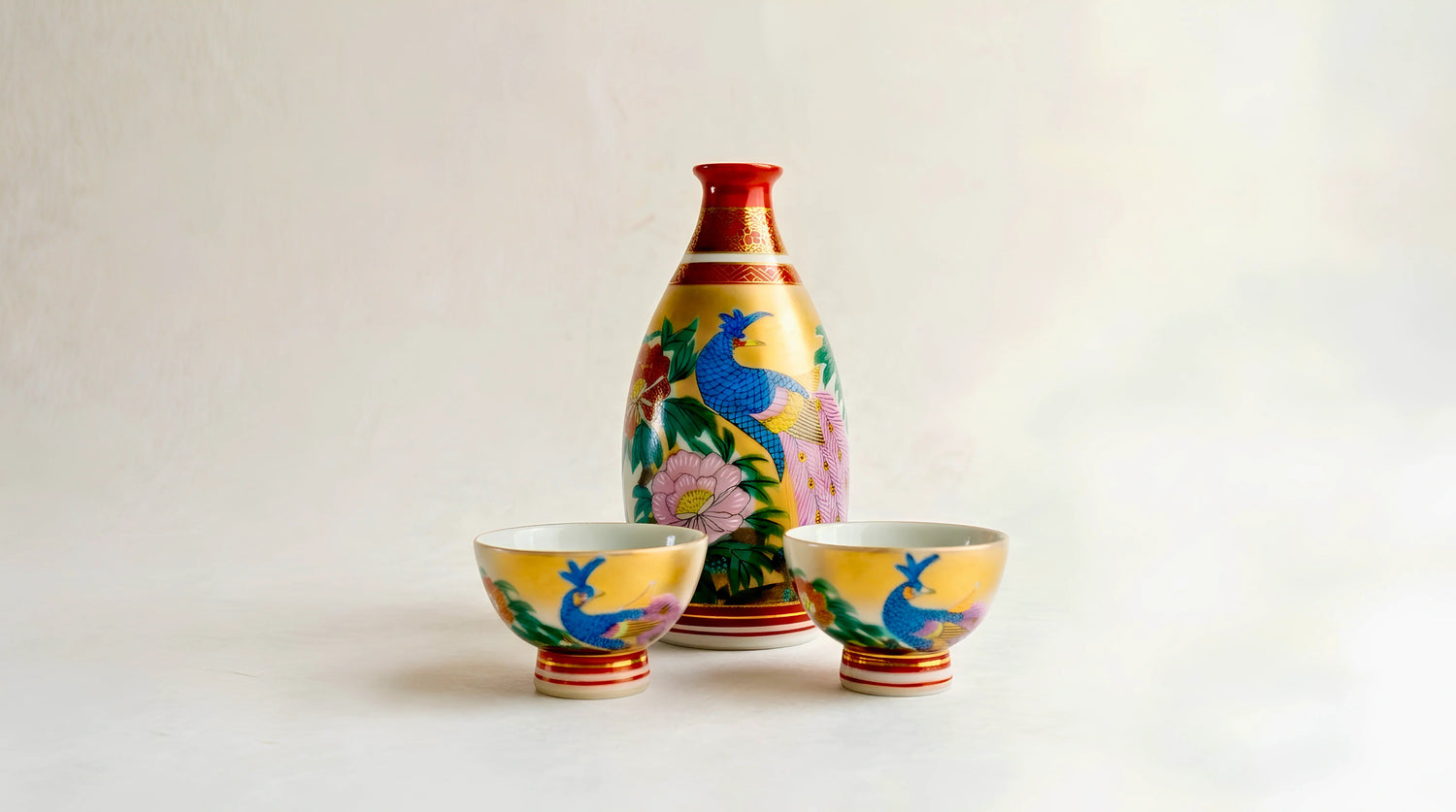 Japanese sake set and cut glass clustered at the centre on washi.