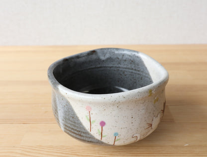 Rear view of Kutani Hidamari matcha bowl showing dark inner glaze