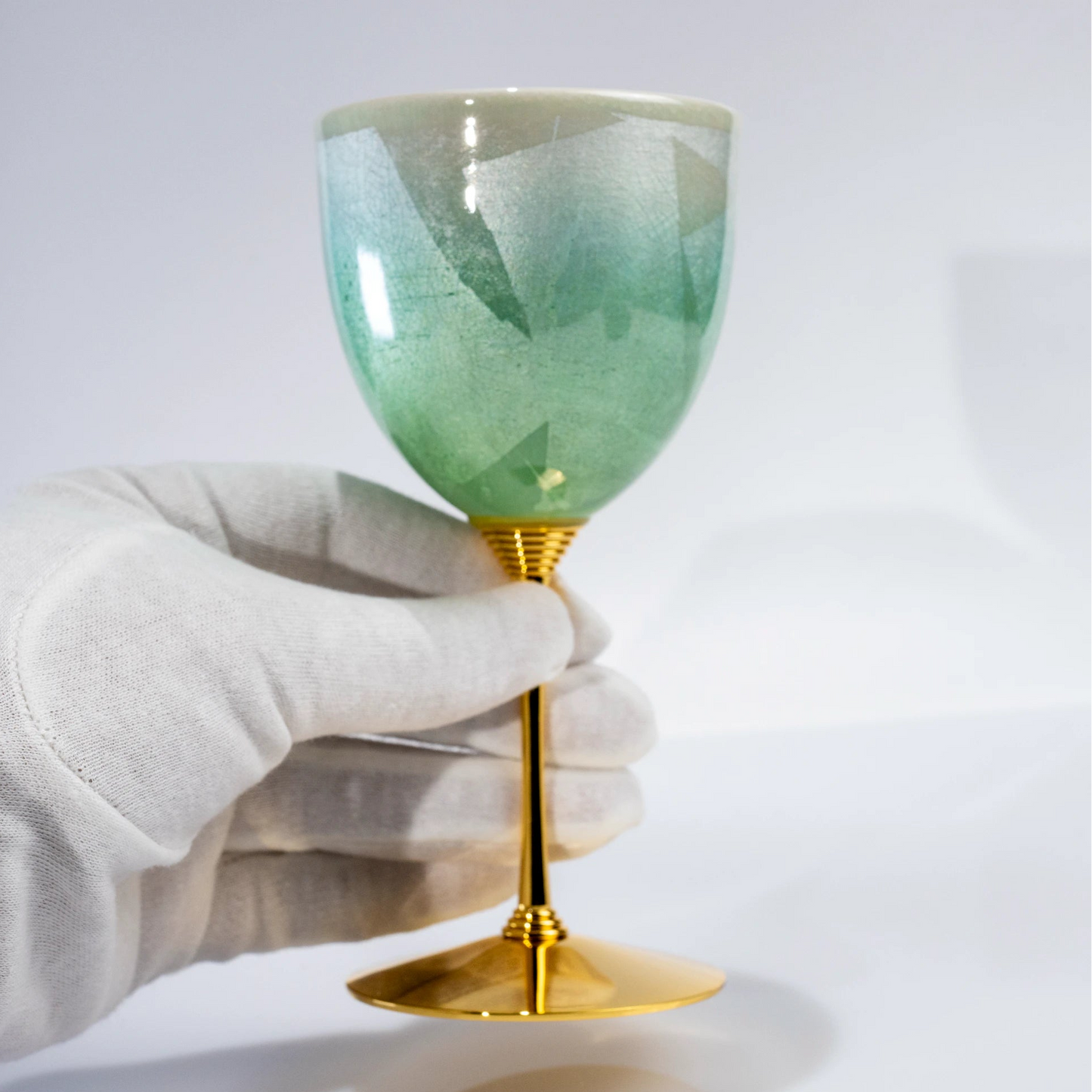 Single Kutani green porcelain wine cup standing upright