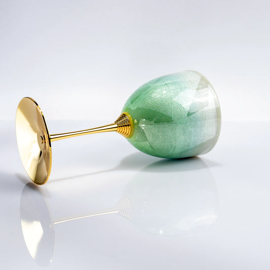 Close-up side view of Kutani green wine cup with gold leaf style finish