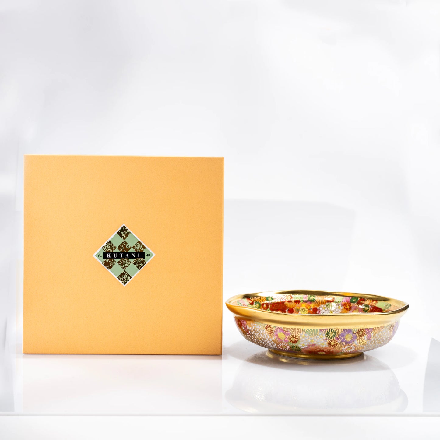 Kutani serving bowl displayed with gift box