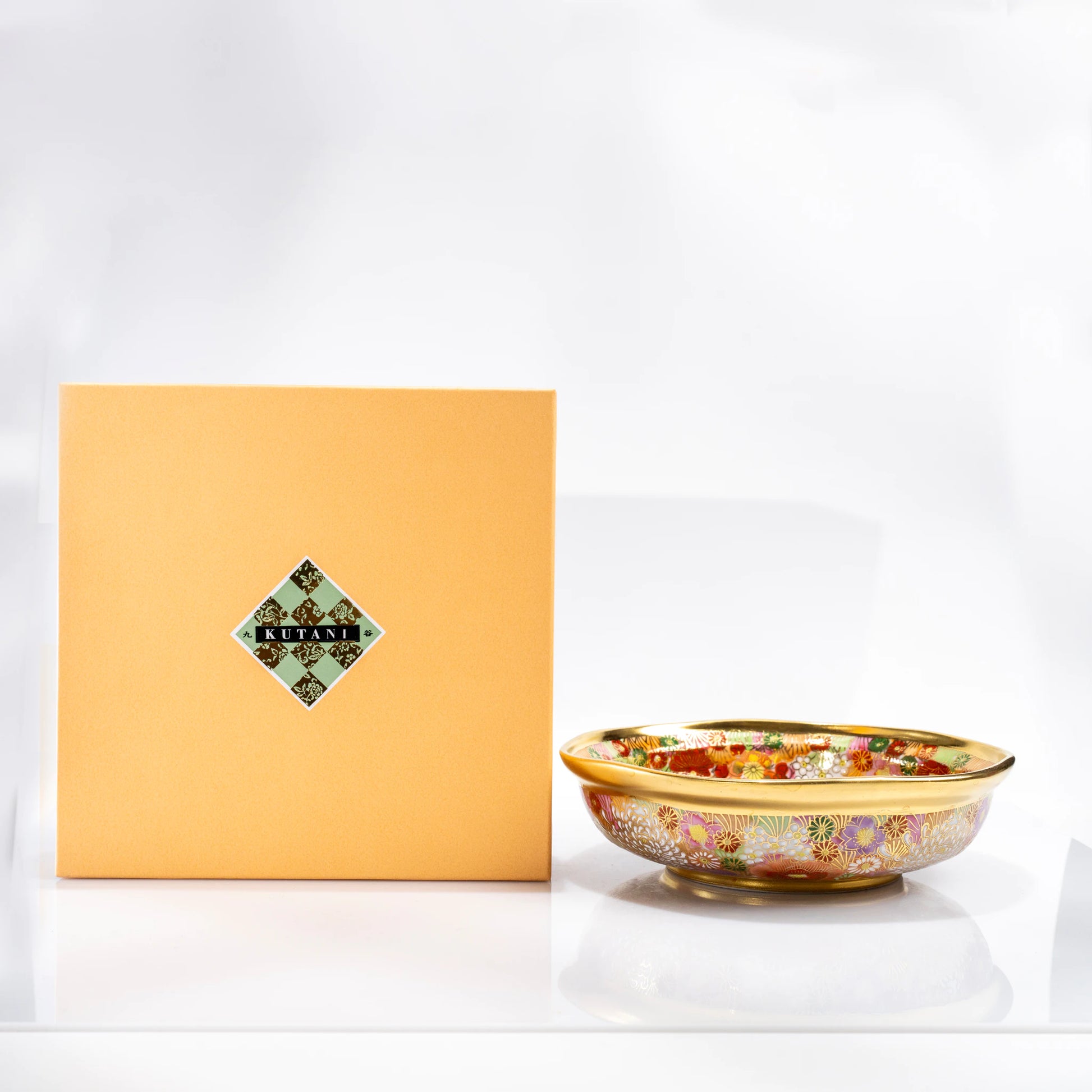Kutani serving bowl displayed with gift box
