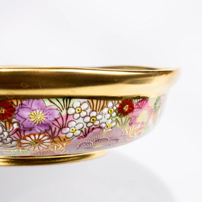 Side close-up of Kutani gold floral serving bowl showing rim and wall detail