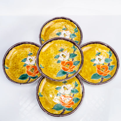 Set of five Kutani yellow dessert plates with hand-painted camellia motifs