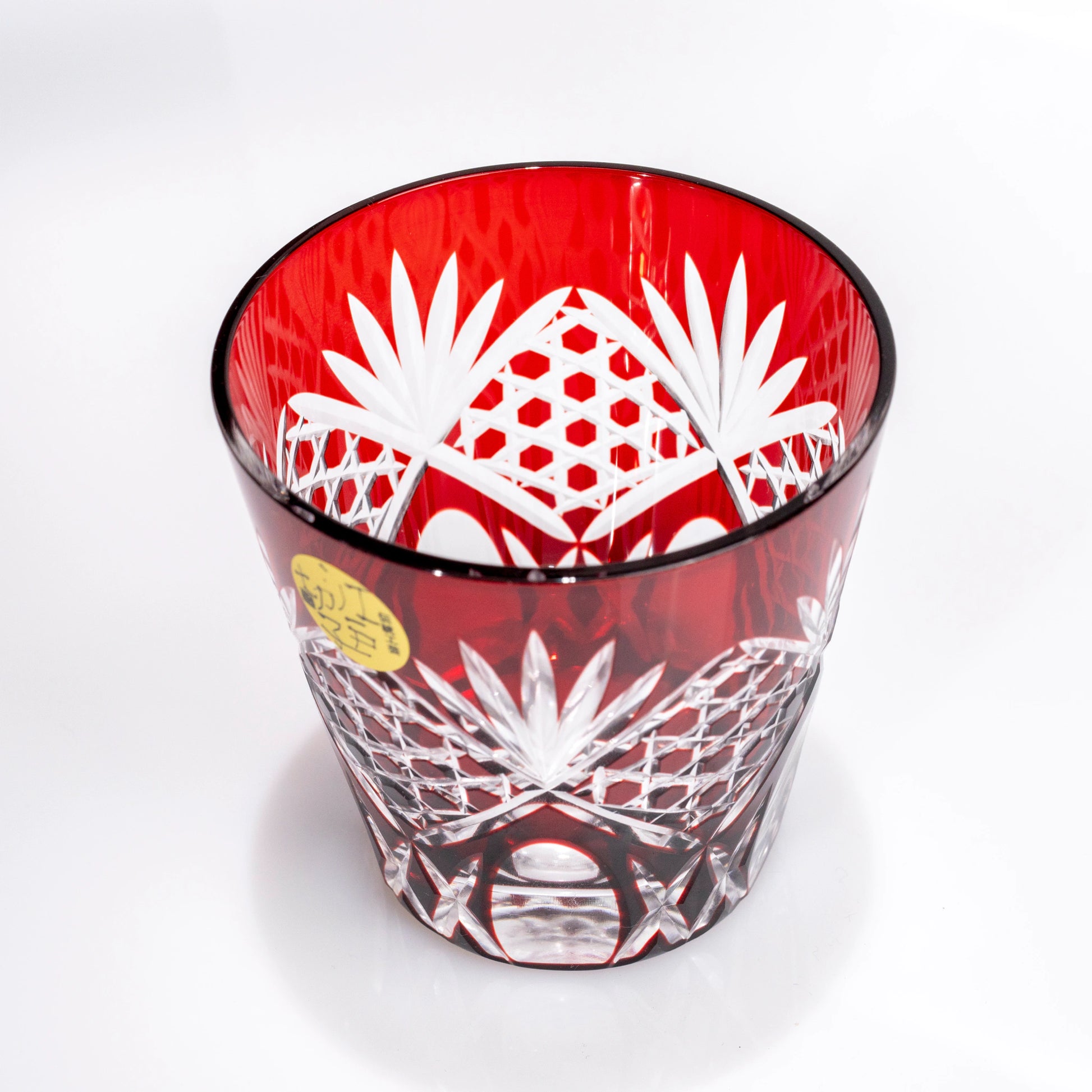 Red Edo Kiriko whiskey tumbler viewed from above with cut rim and pattern detail