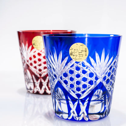 Front view of red and blue Edo Kiriko whiskey tumblers side by side
