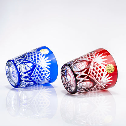 Red and blue Edo Kiriko whiskey tumblers laid on their sides