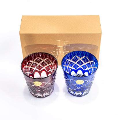 Red and blue Edo Kiriko tumblers displayed in front of open gift box