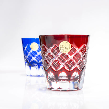 Pair of Edo Kiriko old fashioned glasses in red and blue, front hero view