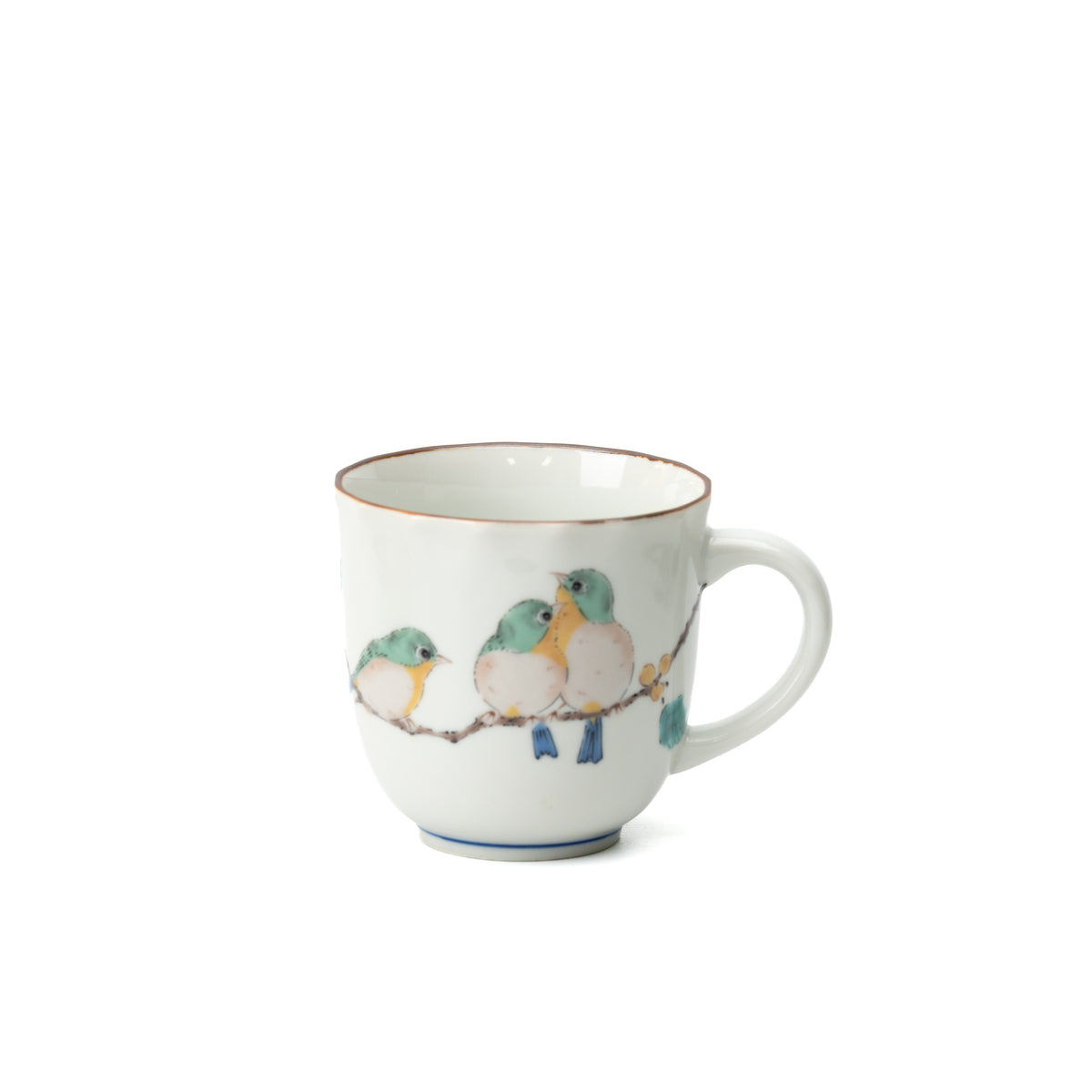 White Mejiro bird mug with three green birds perched on a branch and the handle to the right.