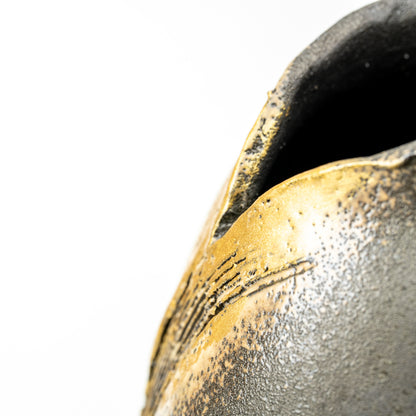 Detail of the curved lip and gold-colored brushwork around the Banju vase opening.