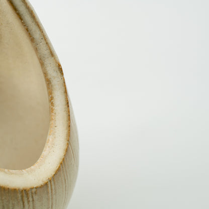 Close-up of the thick curved edge around the Kairo vase's large loop opening.