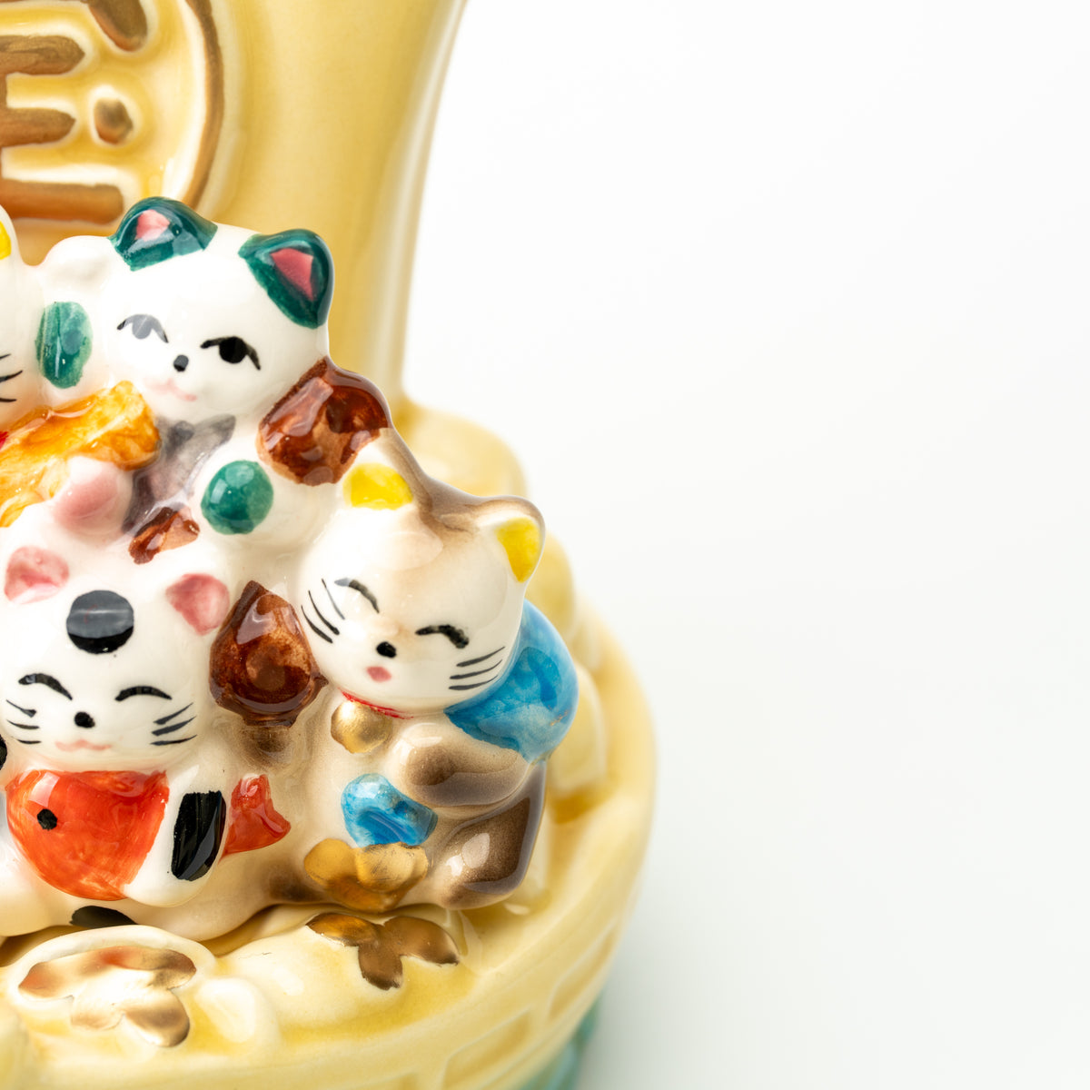 Detail of the treasure ship's front-right cats, yellow deck and small gold-colored accents.