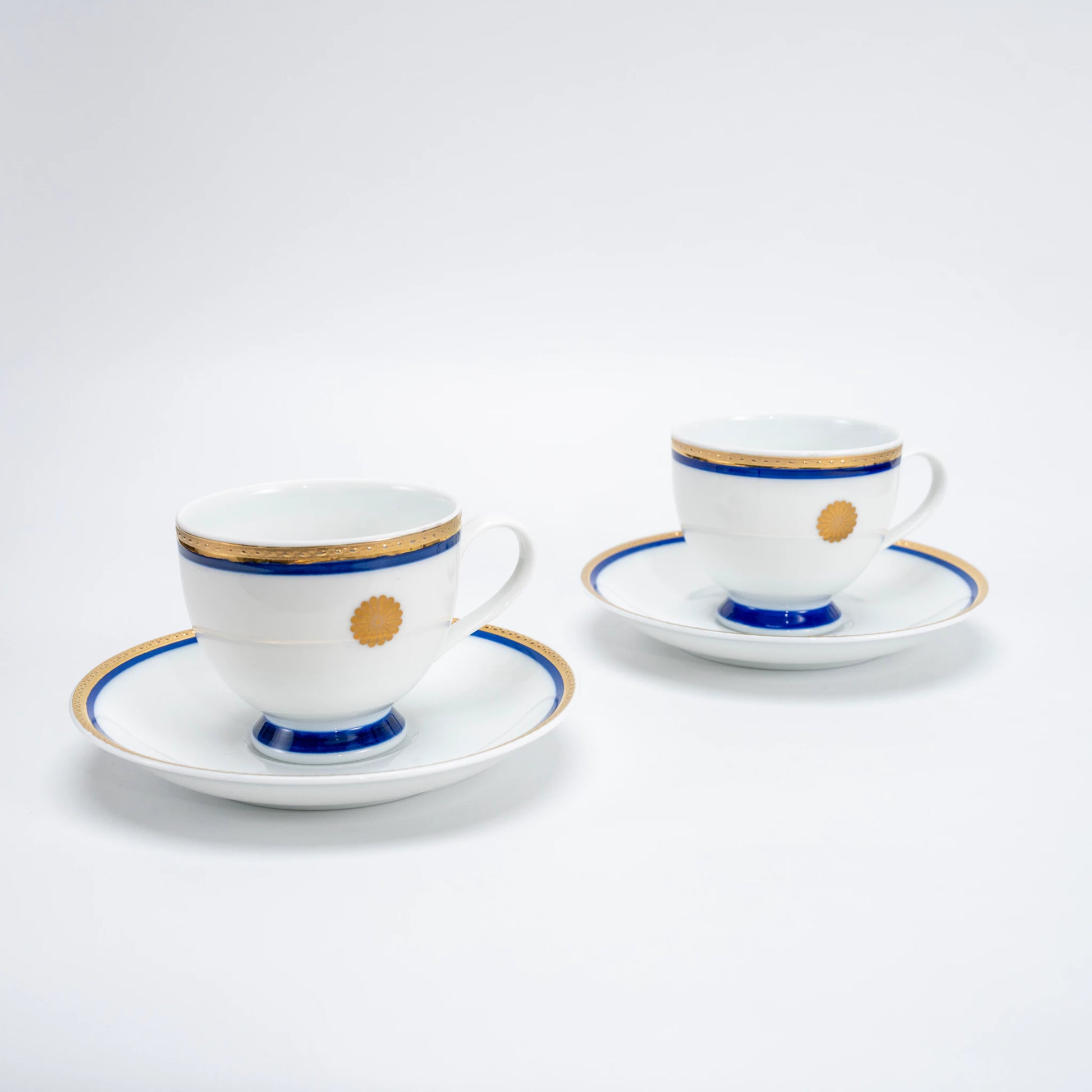 Vintage 1980 Japanese Kikumon Chrysanthemum Mino-yaki Cup & Saucer Pair — view 1