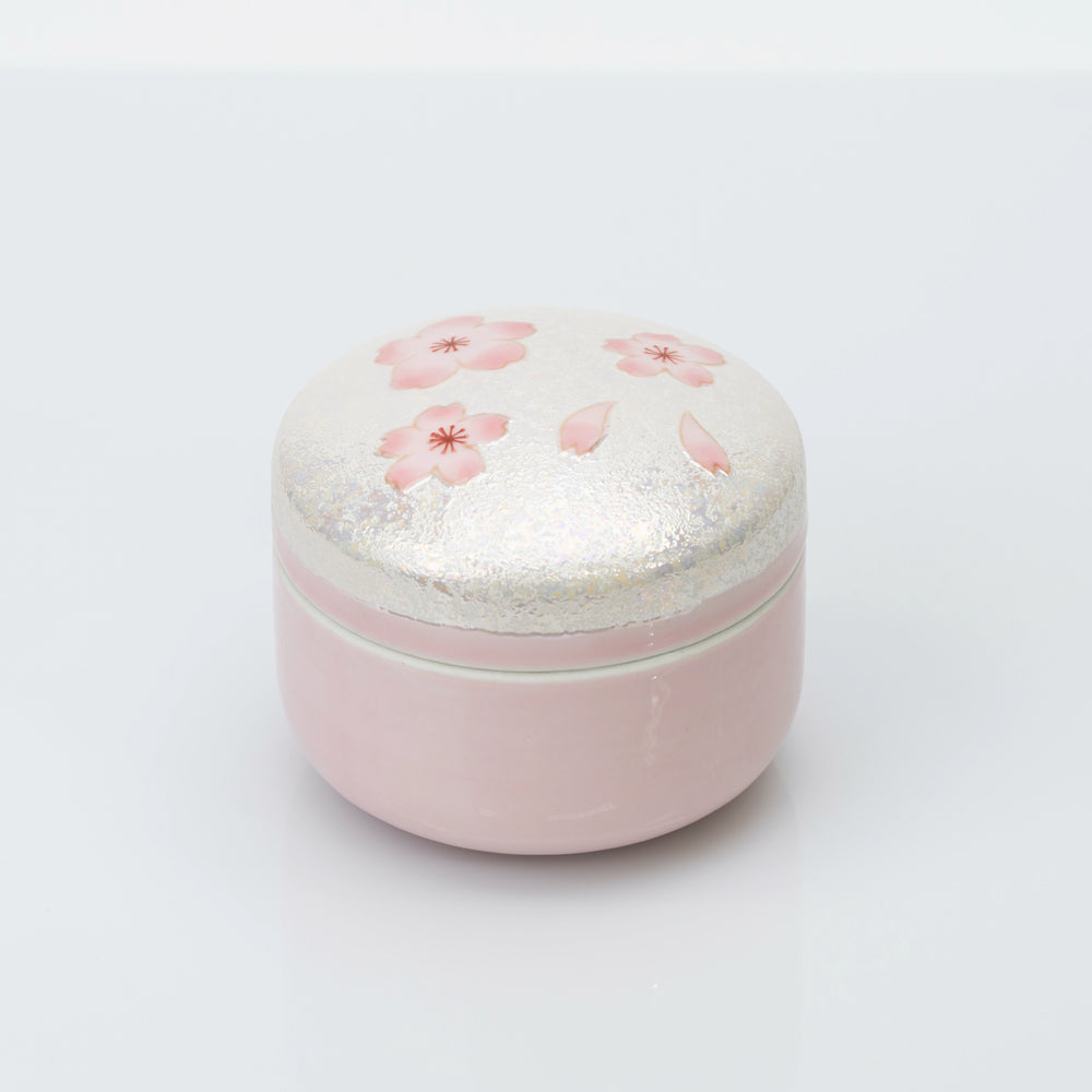 Closed pink Arita cherry blossom lidded box on a white background