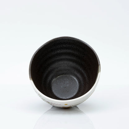 View straight into the bowl showing the dark speckled interior