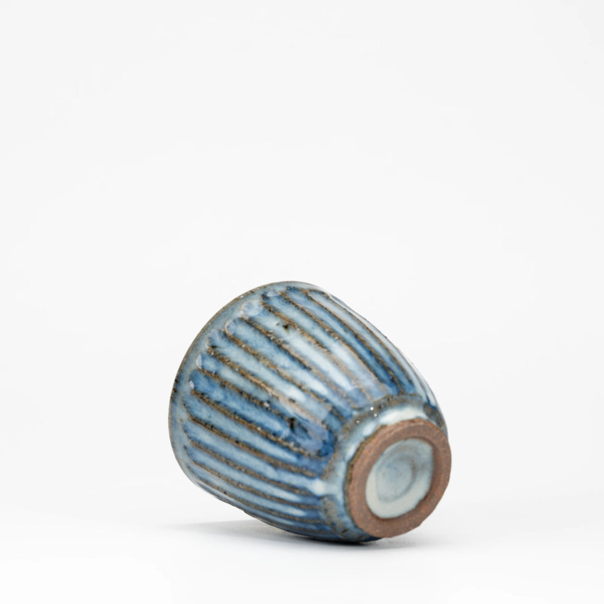 Ribbed blue-grey tea cup, underside and foot.