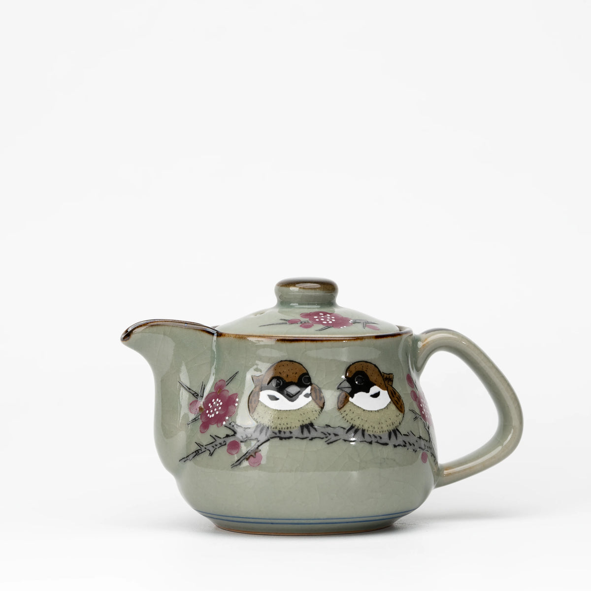 Sparrow teapot, whole view on a neutral background.