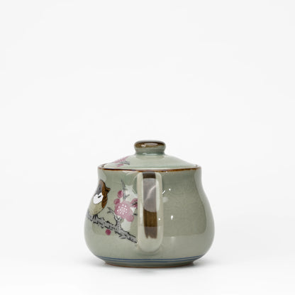 Sparrow teapot, side view showing the shape and surface.