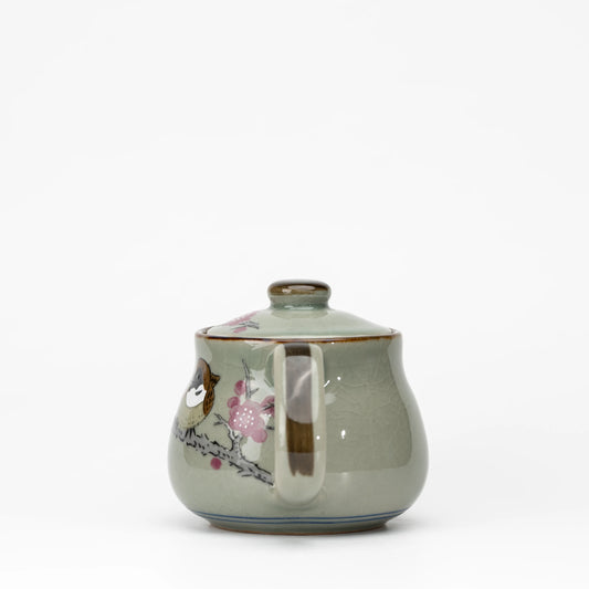 Sparrow teapot, side view showing the shape and surface.