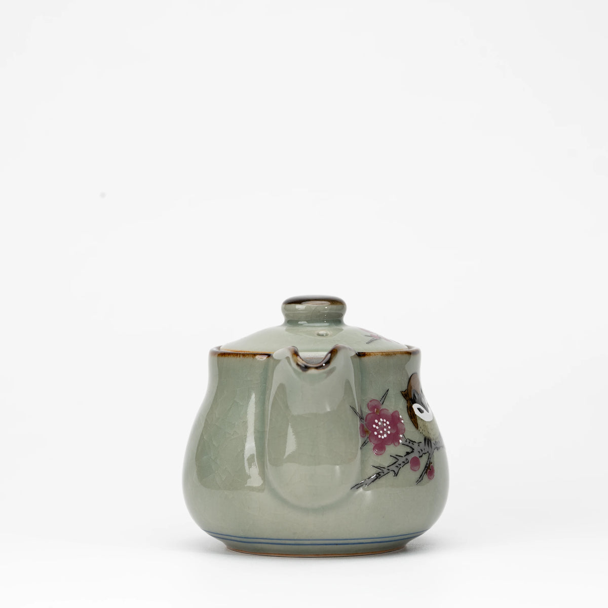 Sparrow teapot, side view showing the shape and surface.