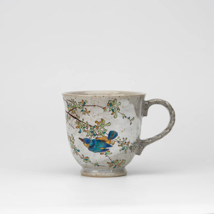 Kingfisher mug, whole view on a neutral background.