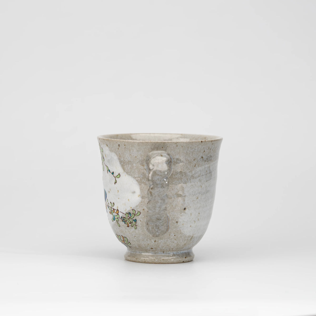 Kingfisher mug, side view showing the shape and surface.
