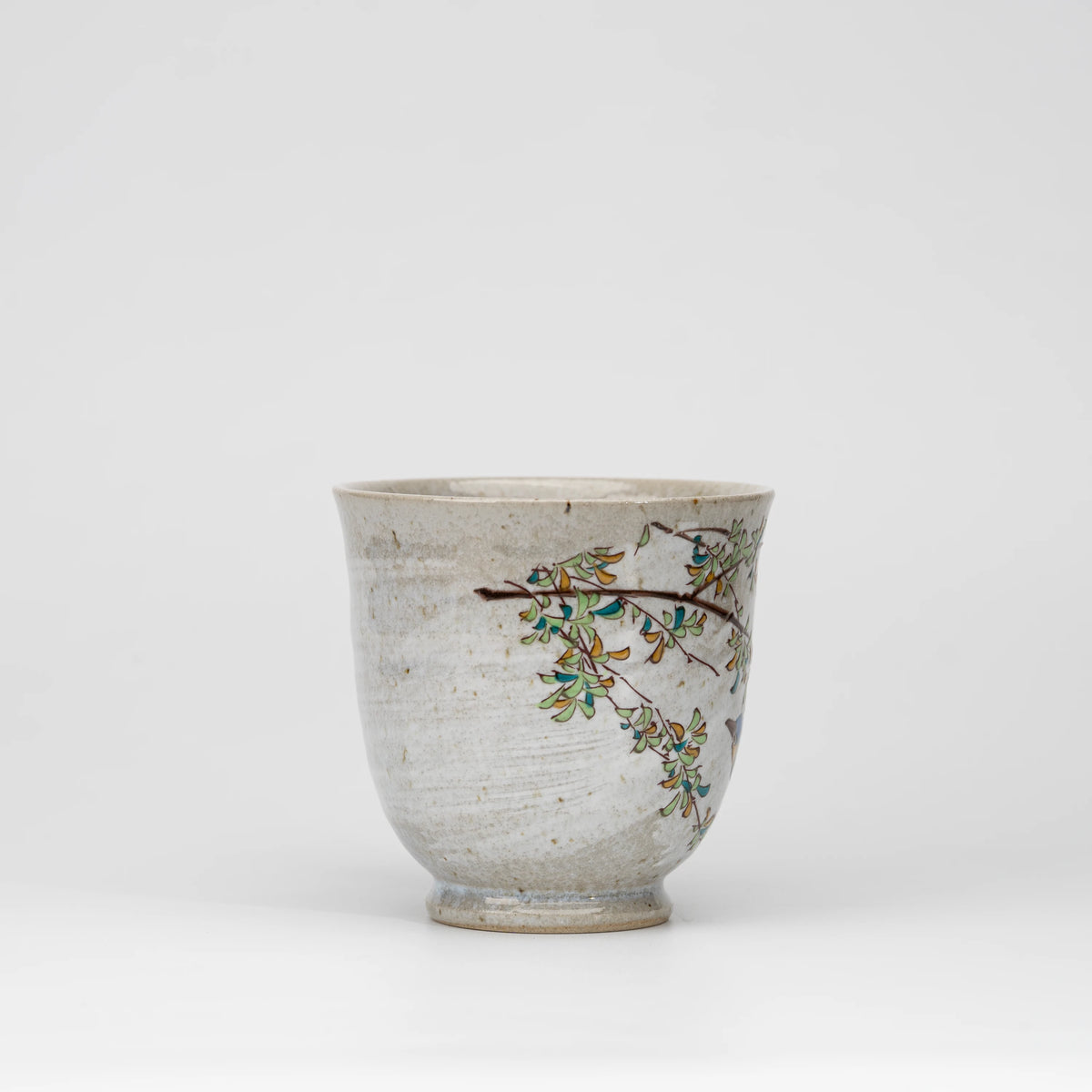 Kingfisher mug, side view showing the shape and surface.