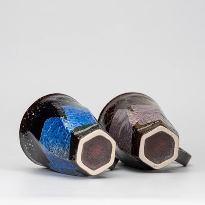 Blue and lilac ginsai mug pair, underside and foot.
