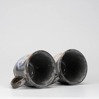 Rabbit and moon mug pair, view from above showing the opening and interior.
