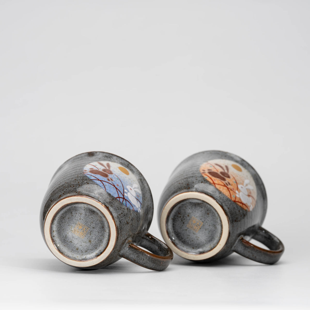 Rabbit and moon mug pair, underside and foot.