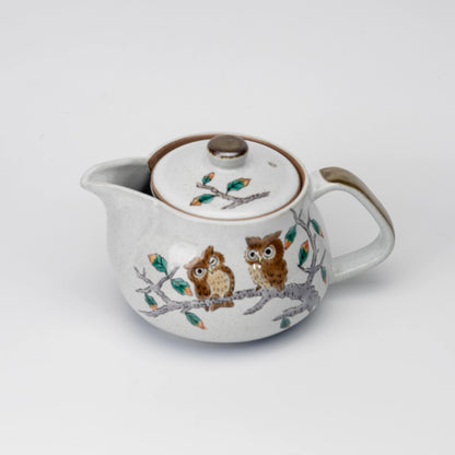 Owl teapot, side view showing the shape and surface.