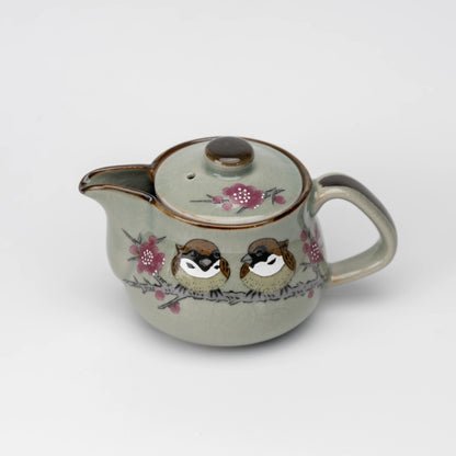 Sparrow teapot, elevated view of the complete teapot with its lid on.