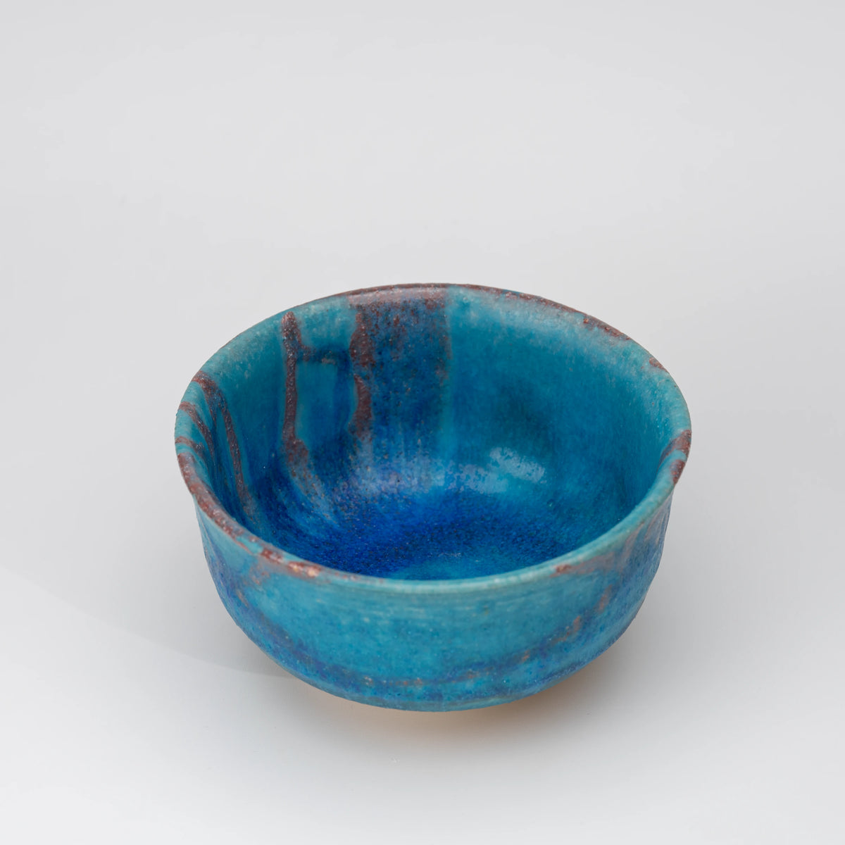 Blue Tsuyukusa matcha bowl, whole view on a neutral background.