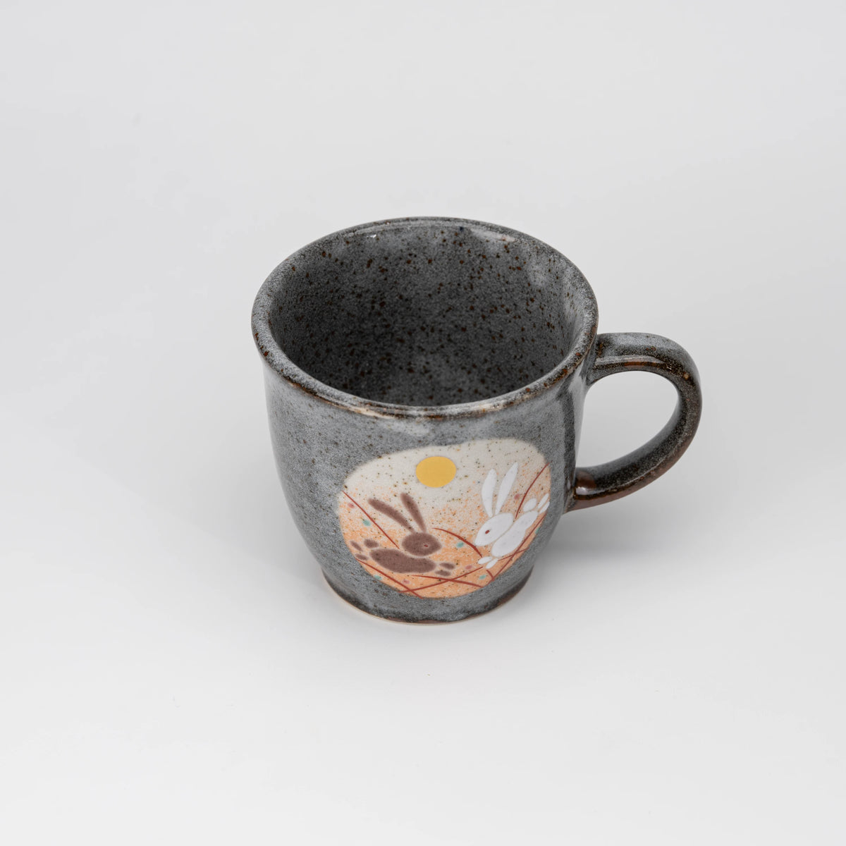 Rabbit motif mug, view from above showing the opening and interior.