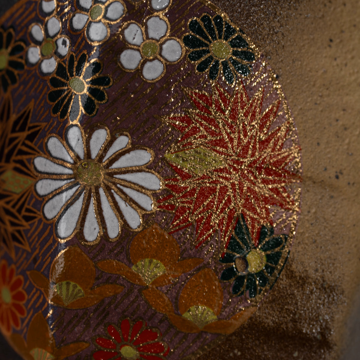 Dark floral medallion cup, floral medallion detail.